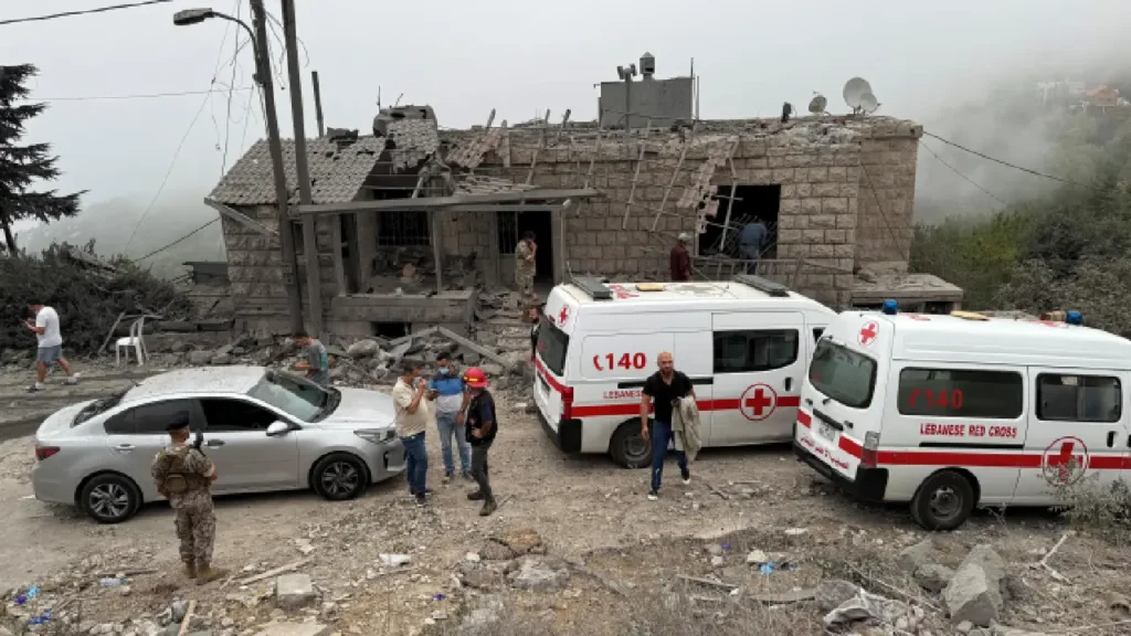 Aerial view of damaged residential building in Aitou, Lebanon.