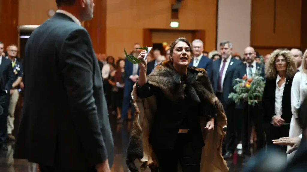 Senator Lidia Thorpe protesting in Parliament House