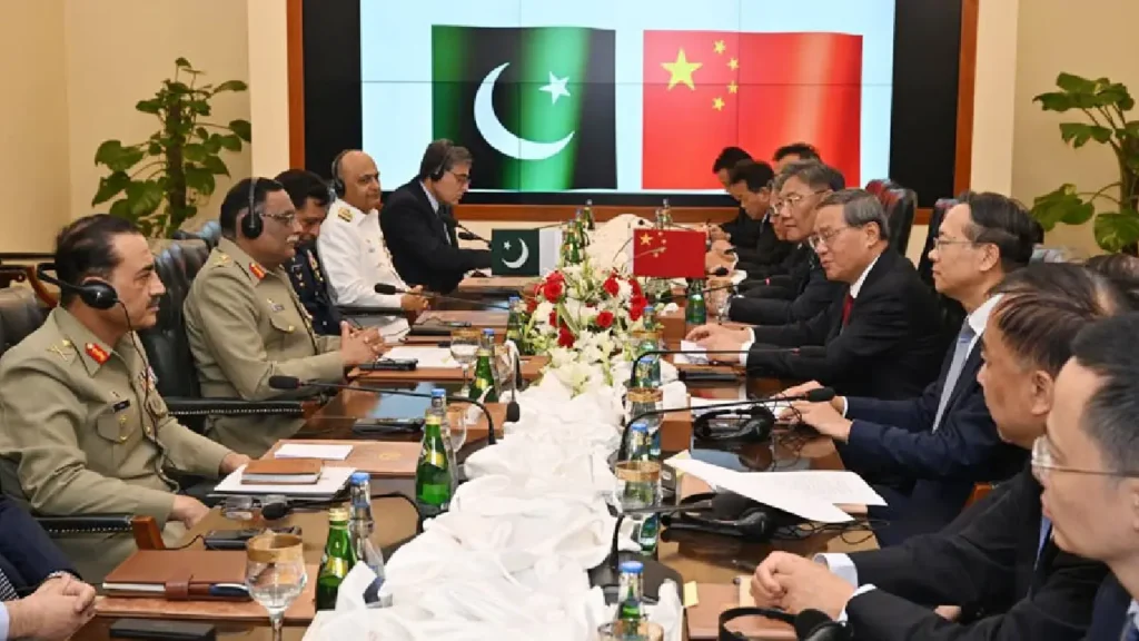 Consul General Yang Yundong speaking at Karachi media briefing Karachi-Hyderabad motorway construction under CPEC Aerial view of Gwadar Port development projects CPEC workers collaborating on a construction site in Pakistan China-Pakistan Economic Corridor infrastructure progress