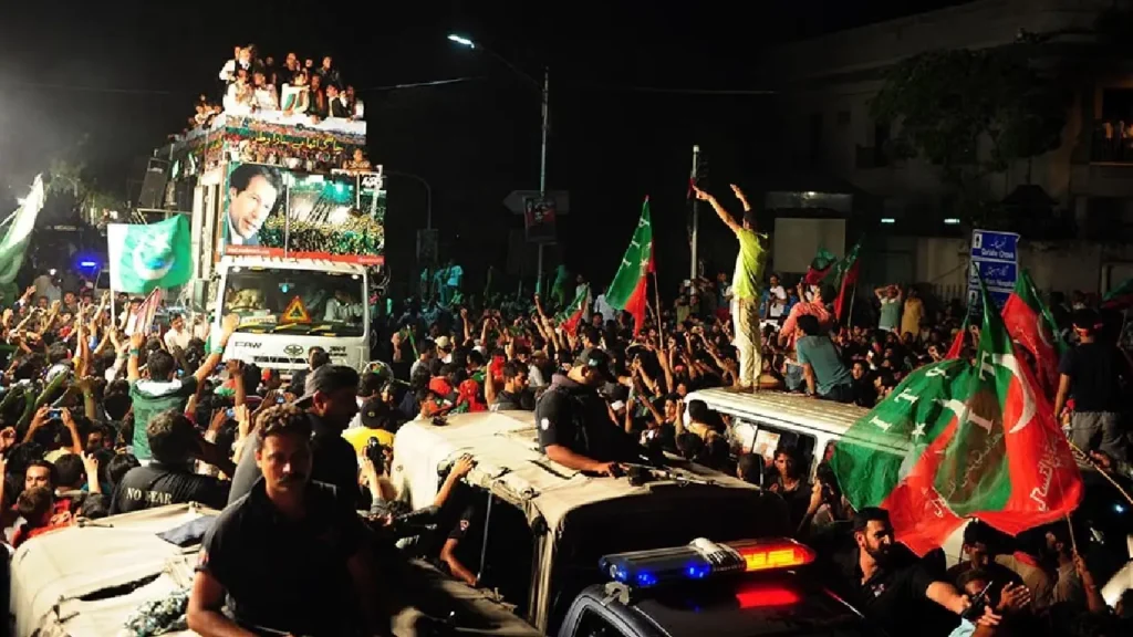 PTI convoy with industrial fans to counter tear gas. PTI supporters using alternative routes to bypass blockades. Ali Amin Gandapur leading the PTI march from KP to Islamabad. Protesters clashing with police near Attock.