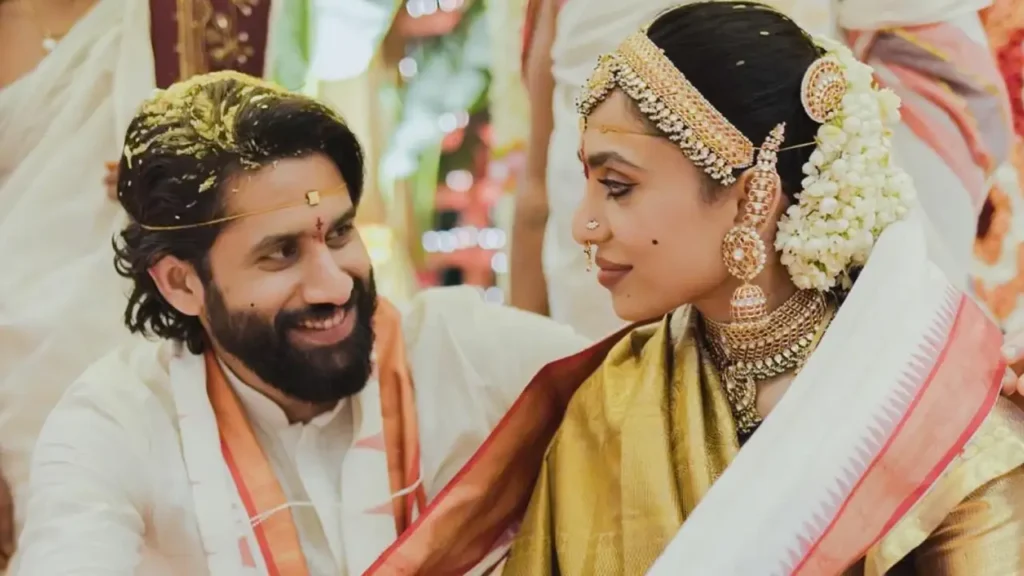 "Naga Chaitanya and Sobhita Dhulipala in traditional wedding attire"