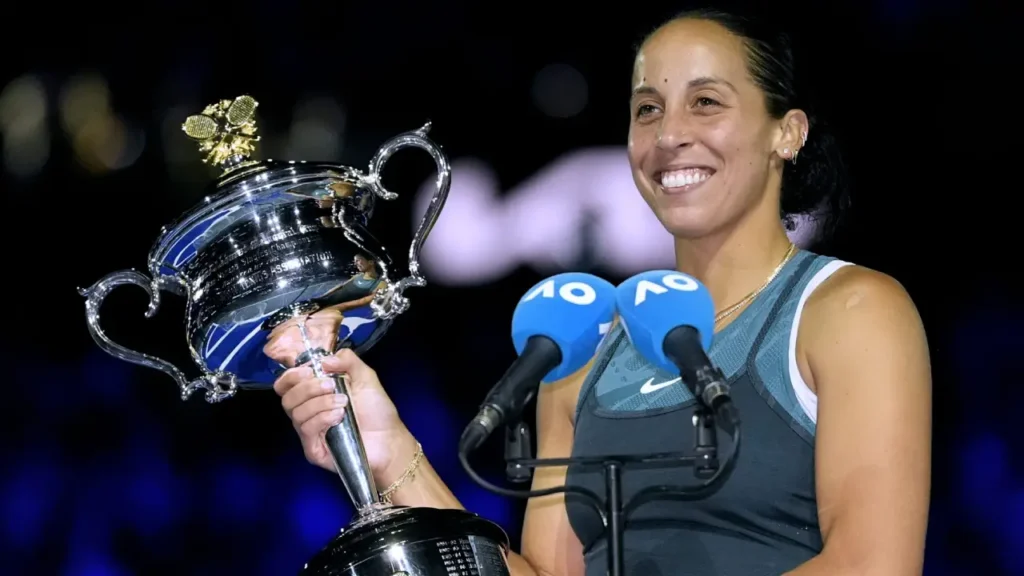 Madison Keys celebrating Australian Open 2025 win. Madison Keys lifting her maiden Grand Slam trophy. Aryna Sabalenka and Madison Keys during the final match.