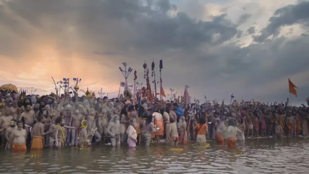 Devotees taking a holy dip at Triveni Sangam during Mahakumbh 2025. Massive crowd at the Maha Kumbh Mela 2025 in Prayagraj. Spiritual unity as international devotees participate in the Kumbh Mela. Exhibition of Jyotirlingas made of Rudraksha beads at Shiv Nagari.