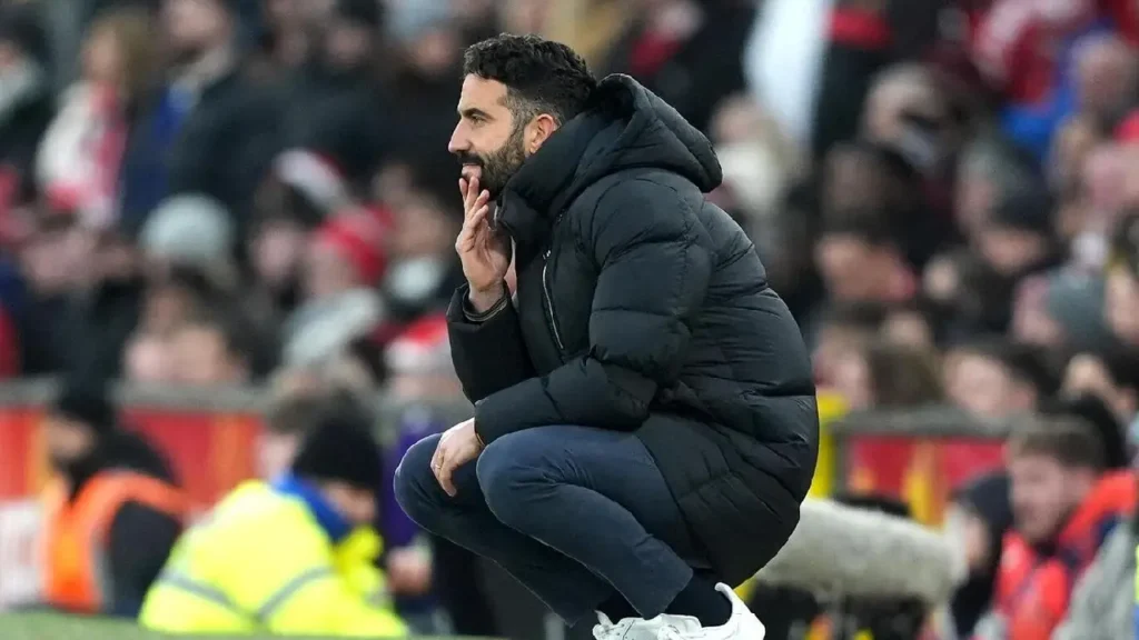 "Ruben Amorim frustrated during Manchester United's match." "Manchester United dressing room TV damaged after Brighton defeat." "Ruben Amorim discusses Manchester United's tactical challenges."