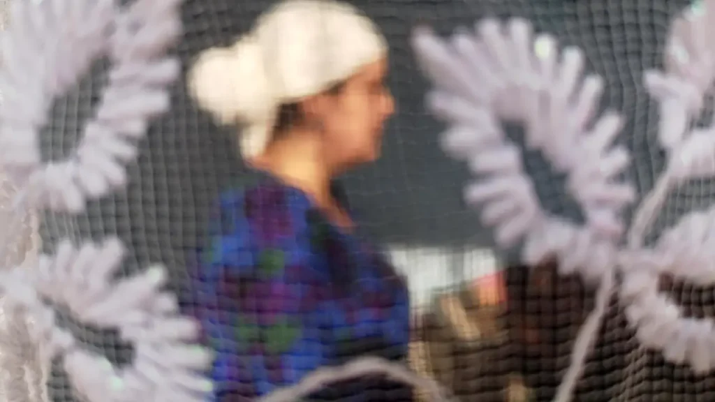 "Tajik fortune teller conducting a secret ritual" "Tajik authorities enforcing crackdown on occult practices" "An incense-lit room used by a fortune teller in Dushanbe"