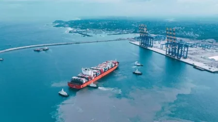 Vizhinjam Seaport, Kerala Finance Minister, Adani Ports, India’s largest port, Kerala economy, global trade, maritime sector, container transshipment, international shipping lanes, shipping logistics