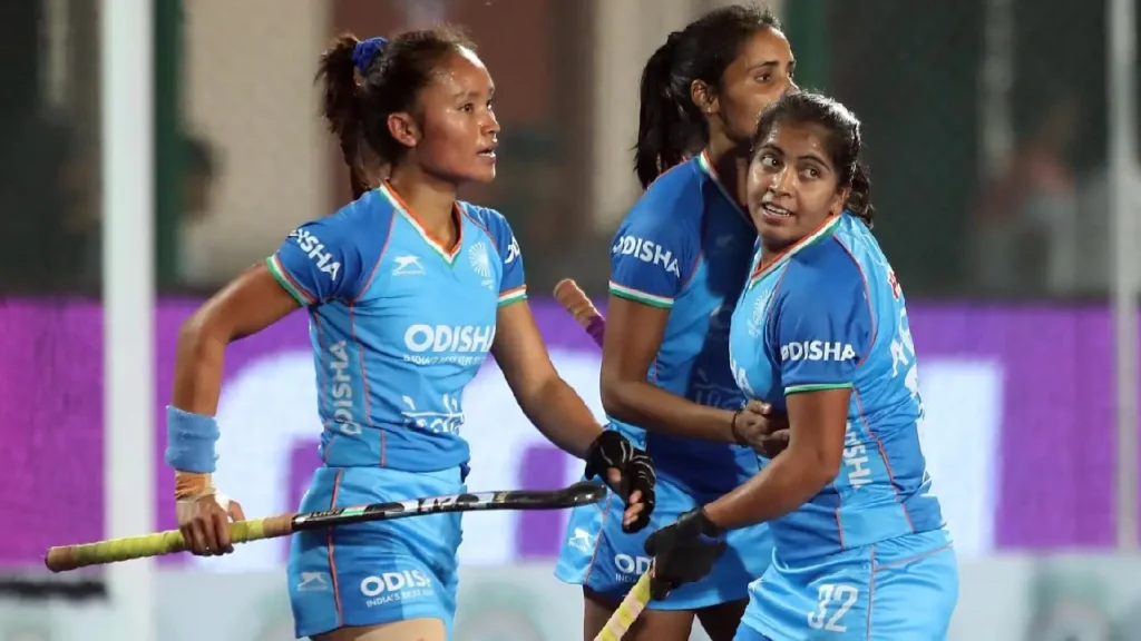 Navneet Kaur leading Delhi SG Pipers in HIL action Neha Goyal addressing the financial benefits of WHIL Odisha Warriors players gearing up for the match Cultural performance during the Women's Hockey India League opening ceremony